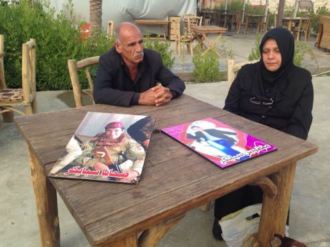 The parents of Imad al-Jubouri, one of the missing recruits, tell their story at a restaurant in Baghdad on March 29, 2015.