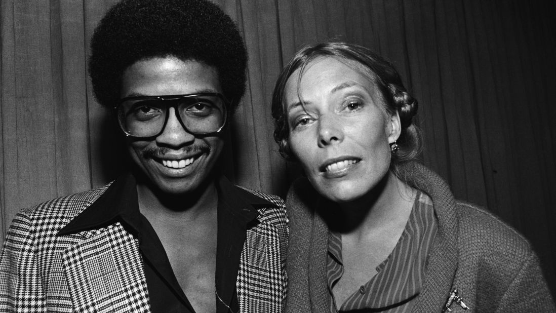 Mitchell joins Herbie Hancock backstage in Berkeley, California, in 1982.