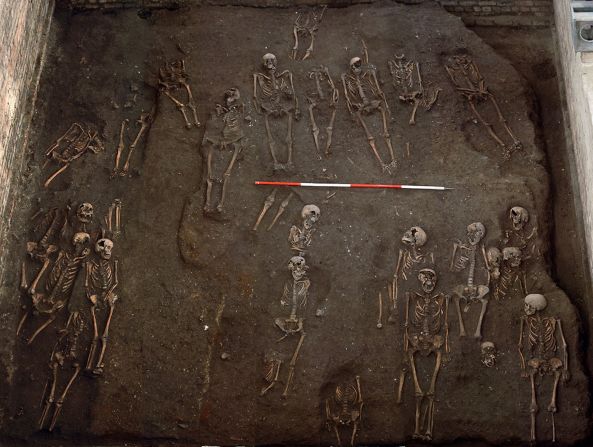 Newly released photos show one of Britain's largest medieval hospital burial grounds, lying beneath a college at the University of Cambridge in southern England.