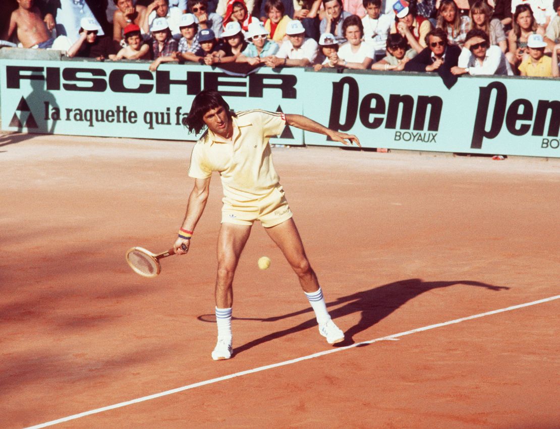 Ilie Nastase returns a ball during the Paris International tournament in June 1977. 