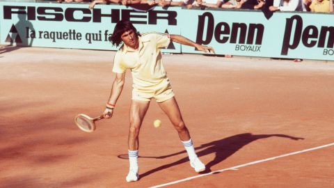 Ilie Nastase returns a ball during the Paris International tournament in June 1977. 