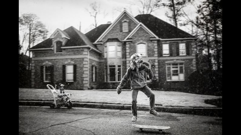 The images in "Strong is the New Pretty" are meant to inspire kids -- and their parents -- to be whoever they are, whether that means loud and athletic, quiet and artistic or anything in between. The images so far capture her girls' reality, which often unfolds in a blur on the streets of their neighborhood near Atlanta.