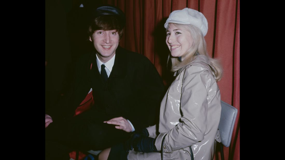 John and Cynthia Lennon are seen at an airport in London before a flight to New York in 1964. They were married from 1962-1968.