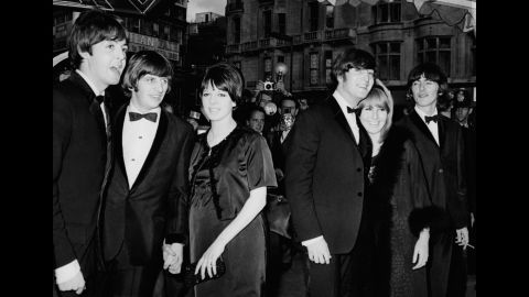 From left, Paul McCartney; Ringo Starr and his wife, Maureen; John and Cynthia Lennon; and George Harrison pose for photographers at the London premiere of Dick Lister's film "Help" in July 1965.