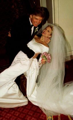 Donald Trump dips Marla Maples after the couple married in a private ceremony amid tight security at the Plaza Hotel December 20, 1993, following a six-year courtship.