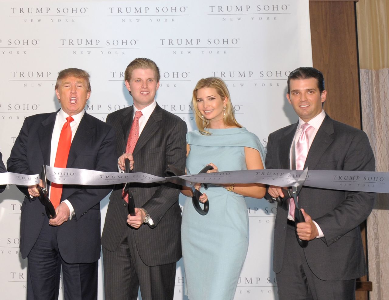 Trump and his children Eric (second from left), Ivanka and Donald Jr. attend the ribbon-cutting ceremony for Trump SoHo New York at Trump SoHo on April 9, 2010, in New York City.