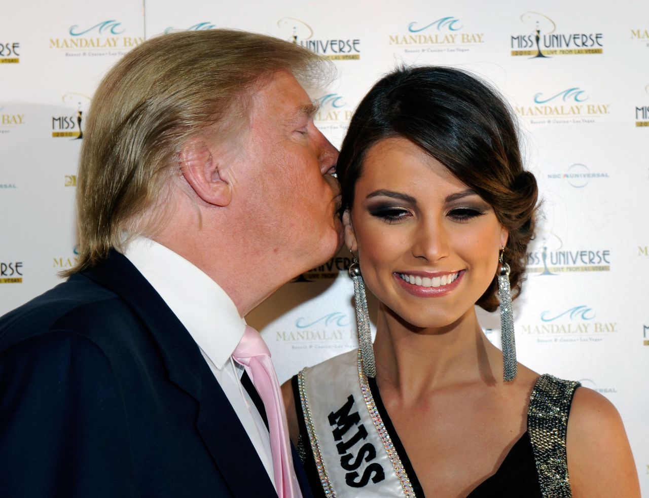 Trump kisses Miss Universe 2009 Stefania Fernandez as they arrive at the 2010 Miss Universe Pageant at the Mandalay Bay Events Center on August 23, 2010, in Las Vegas.