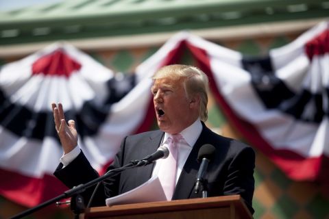 Trump speaks to a crowd at the Palm Beach County Tax Day Tea Party on April 16, 2011, at Sanborn Square in Boca Raton, Florida.