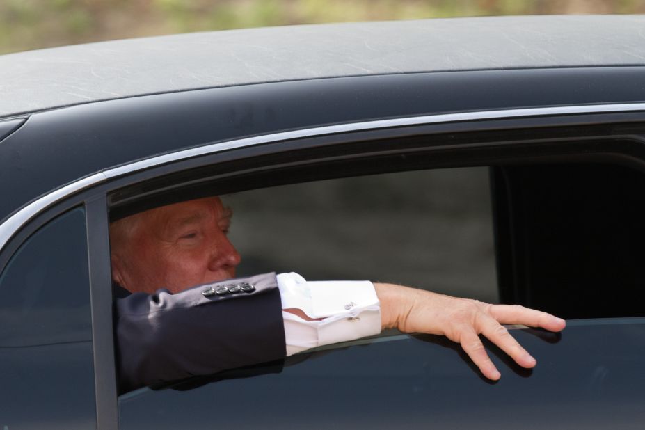 Trump looks out the window of his limousine after visiting Newick's Lobster House on April 27, 2011, in Dover, New Hampshire.