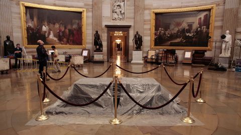 A plastic sheet shrouds <a href="http://www.aoc.gov/nations-stage/catafalque" target="_blank" target="_blank">the catafalque</a>, or platform, originally built to support the casket while the President lay in state in the U.S. Capitol Rotunda. It has been used often for dignitaries and elected officials since. Here, it is prepared for honors to former President Gerald Ford in December 2006. The catafalque is normally displayed in the Exhibition Hall at the <a href="http://www.visitthecapitol.gov/" target="_blank" target="_blank">U.S. Capitol Visitor Center</a>. The black drapery on top of the wooden platform has been changed several times over the years.