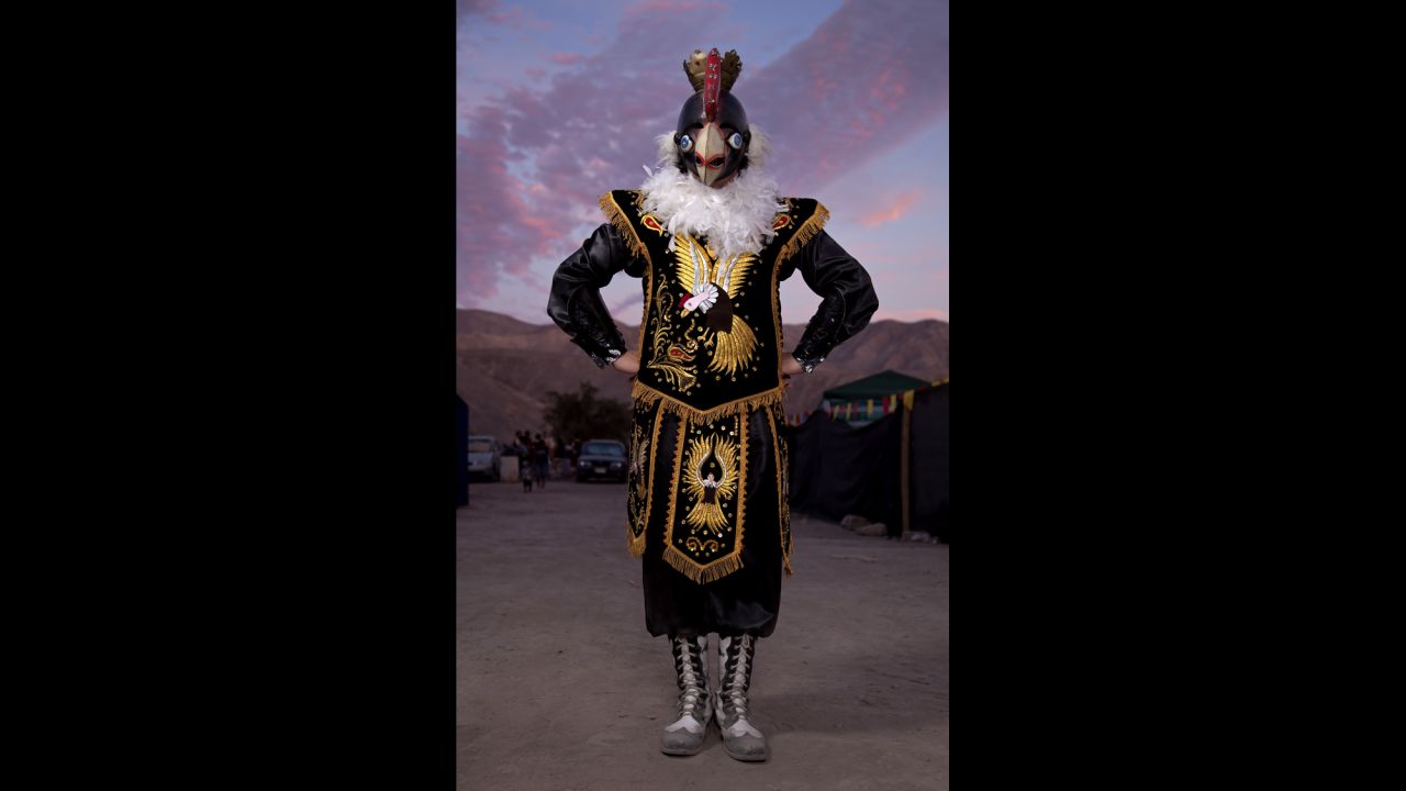 Fabian Quintanilla, from Iquique, dresses in costume for a festival in San Lorenzo de Tarapaca.