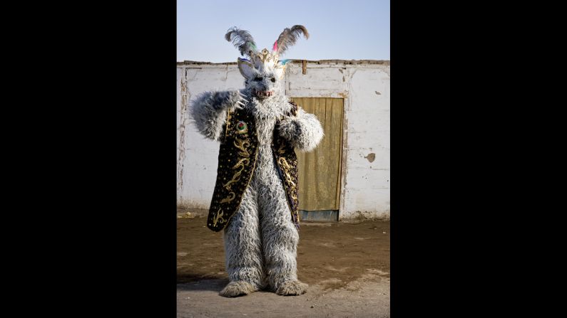 Carlos Callasaya dresses for a festival in La Tirana, Chile. "I was interested in documenting all the signs and symbols that appear in each costume and character, all the indigenous and Catholic syncretism," Figueroa said.