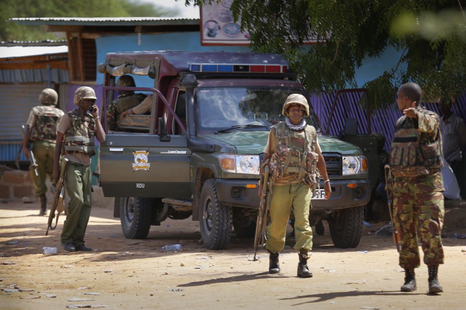 Kenyan soldiers stand guard in front of the school on April 2, 2015.