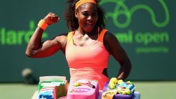 Serena Williams of the United States poses for a photograph with a cake to celebrate her 700th WTA Tour win after her three set victory against Sabine Lisicki of Germany in their quarter final match during the Miami Open Presented by Itau at Crandon Park Tennis Center on April 1, 2015 in Key Biscayne, Florida. (Photo by Clive Brunskill/Getty Images)