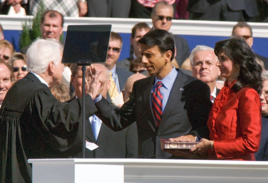 Jindal takes the oath of office on January 14, 2008 -- becoming the country's first Indian-American governor -- while his wife Supriya holds the Bible. 
