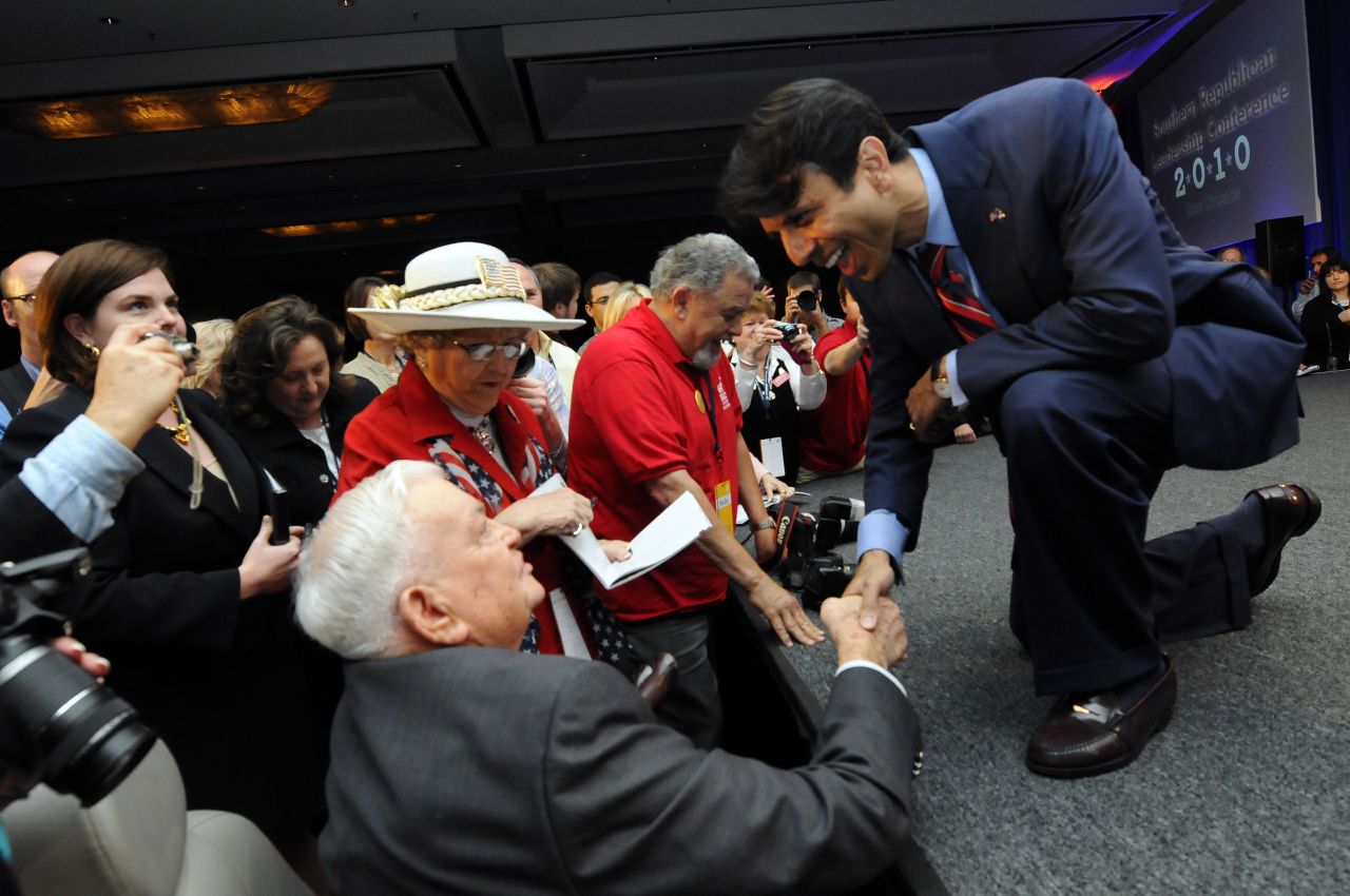 Jindal shakes hands with Marine Corps veteran Elmo Norton after speaking to delegates at the Southern Republican Leadership Conference in New Orleans on April 9, 2010.