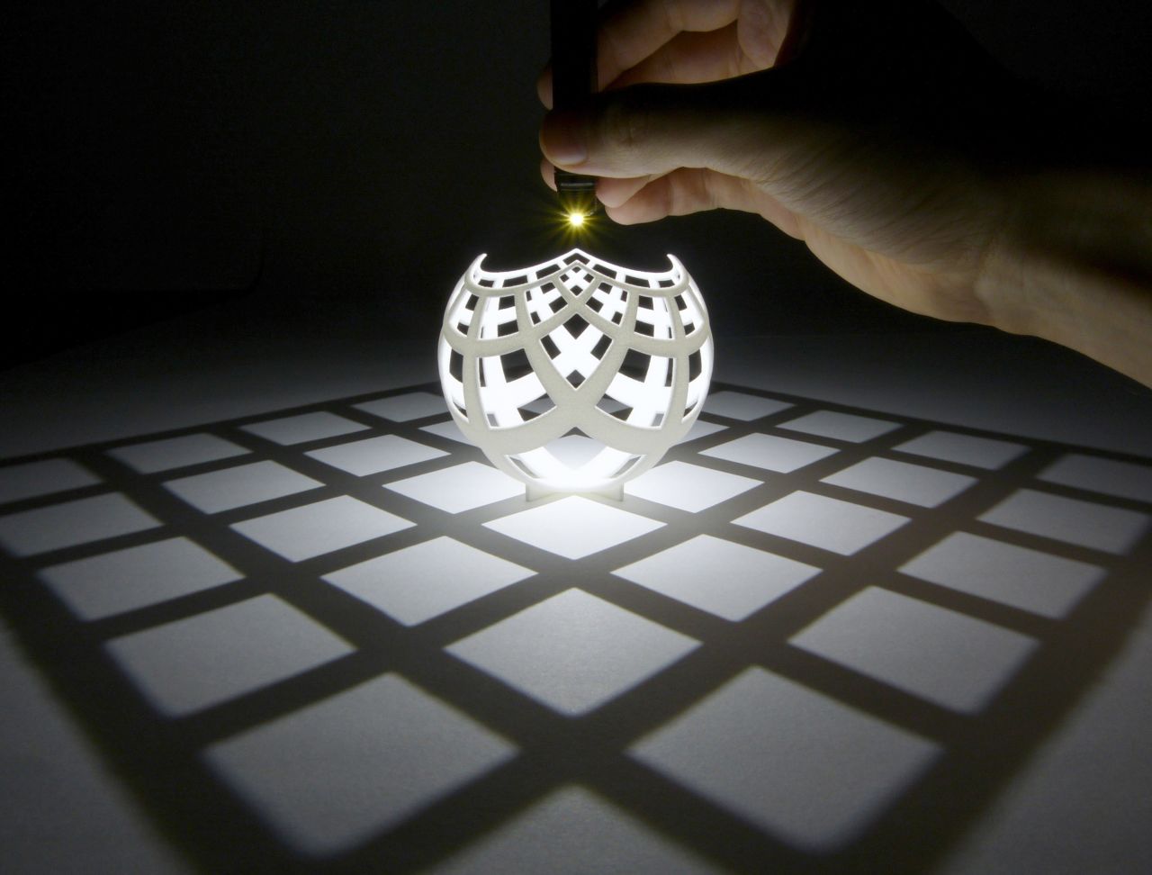 These shadow sculptures, by mathematicians <a href="http://www.shapeways.com/shops/henryseg" target="_blank" target="_blank">Henry Segerman and Saul Schleimer</a>, make use of a phenomenon called "stereographic projection," first used <a href="http://www.theguardian.com/science/alexs-adventures-in-numberland/2014/oct/30/pumpkin-geometry-stunning-shadow-sculptures-that-illuminate-an-ancient-mathematical-technique" target="_blank" target="_blank">to map the earth and the skies</a>.  
