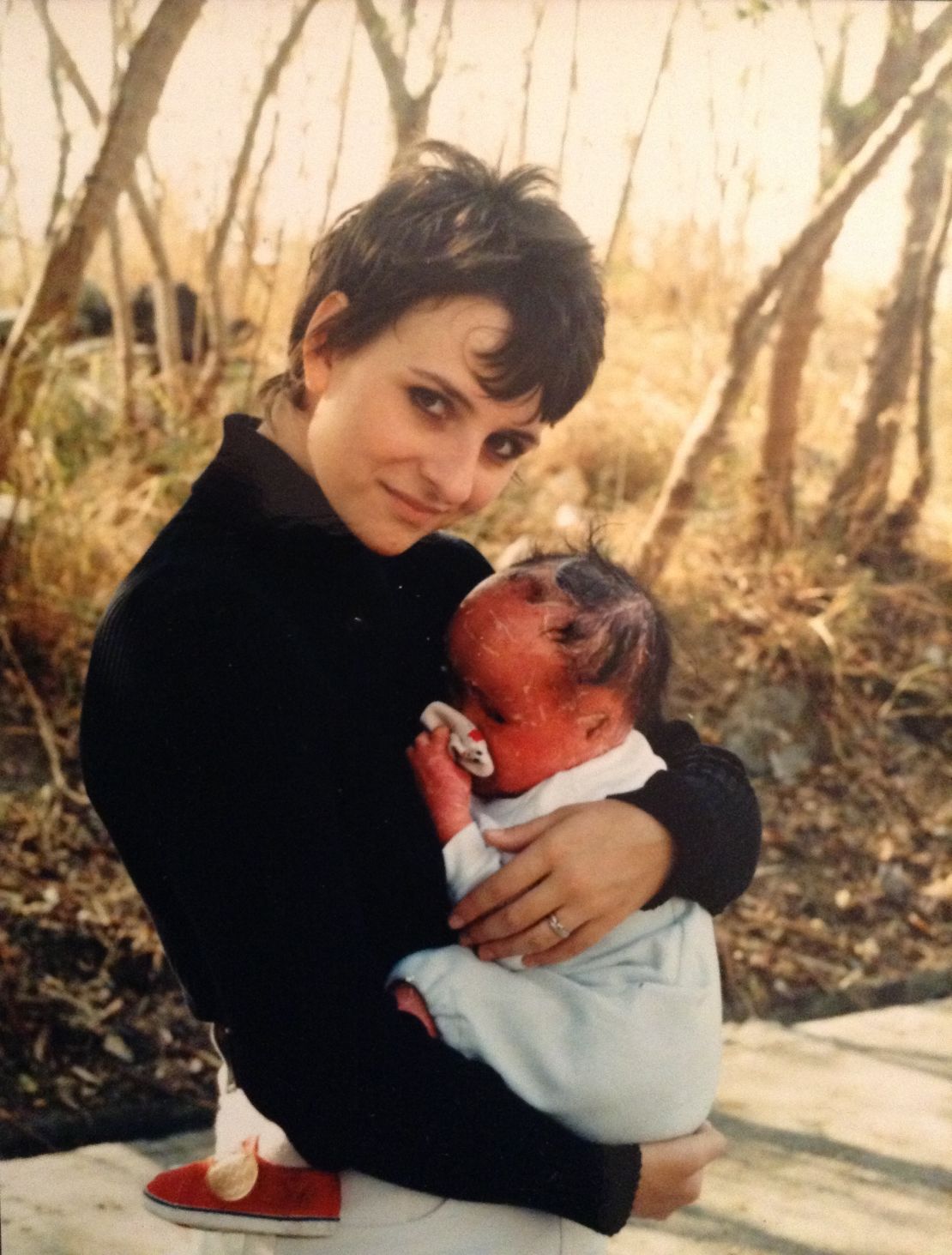 Tina Thomas holds Mui aged 1-1/2 in 1994.