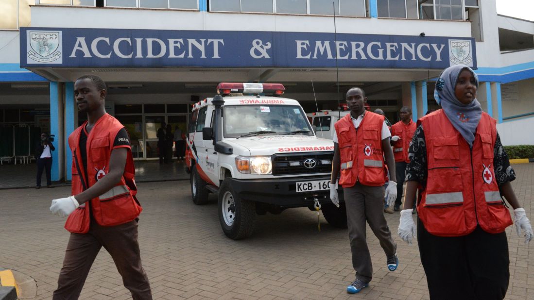 Members of the Kenyan Red Cross gather outside a hospital in Nairobi to receive victims of the attack on April 2, 2015.