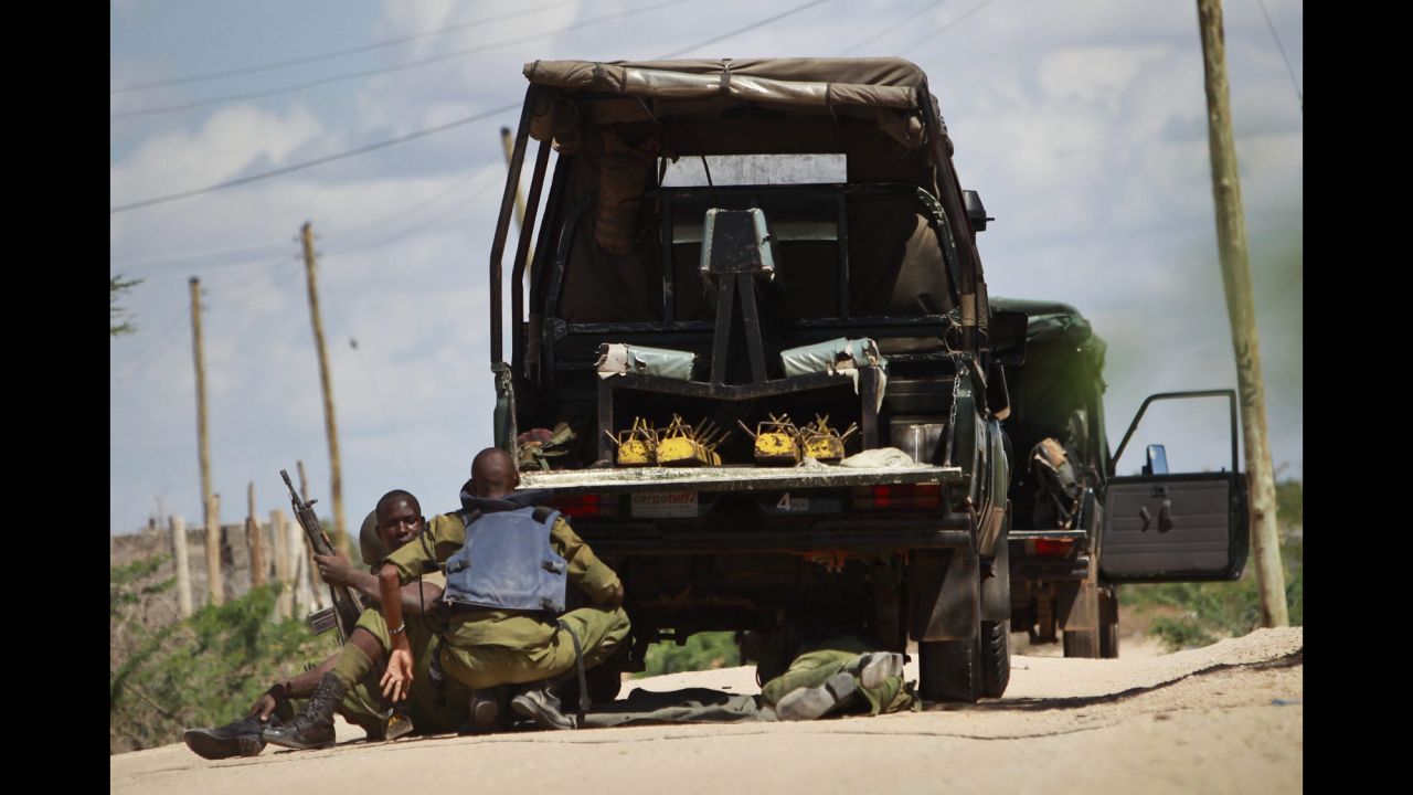 Kenyan soldiers take cover Thursday, April 2, as shots are fired in front of Garissa University College in Garissa, Kenya.<a href="http://www.cnn.com/2015/04/02/world/gallery/kenya-university-attack/index.html" target="_blank"> At least 147 people were killed</a> when a swarm of gunmen stormed the university before dawn, officials said. The Al-Shabaab militant group claimed responsibility for the assault.