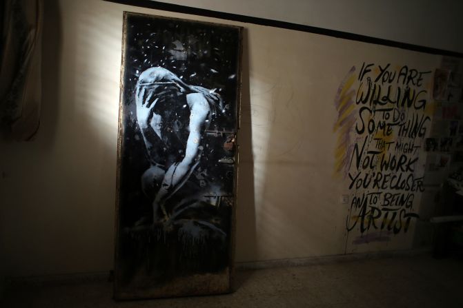 A mural of a weeping woman, painted by the British street artist Banksy, is seen in Khan Yunis, Gaza, on Wednesday, April 1. The mural was painted on a door of a house destroyed last summer during the fighting between Israel and Hamas. The owner of the house <a href="index.php?page=&url=http%3A%2F%2Fedition.cnn.com%2F2015%2F04%2F02%2Fmiddleeast%2Fgaza-war-door-banksy-artist%2Findex.html" target="_blank">said he was tricked into selling the door</a> for the equivalent of $175, not realizing the painting was by the famously anonymous artist. 