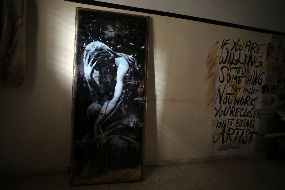 A mural of a weeping woman, painted by the British street artist Banksy, is seen in Khan Yunis, Gaza, on Wednesday, April 1. The mural was painted on a door of a house destroyed last summer during the fighting between Israel and Hamas. The owner of the house <a href="http://edition.cnn.com/2015/04/02/middleeast/gaza-war-door-banksy-artist/index.html" target="_blank">said he was tricked into selling the door</a> for the equivalent of $175, not realizing the painting was by the famously anonymous artist. 