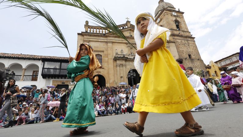 Boys dressed as shepherds take part in the Children's Holy Thursday Procession in Tunja, Colombia, on April 2. In this annual procession, now in its 55th year, children depict the key moments of the passion, death and resurrection of Christ. 