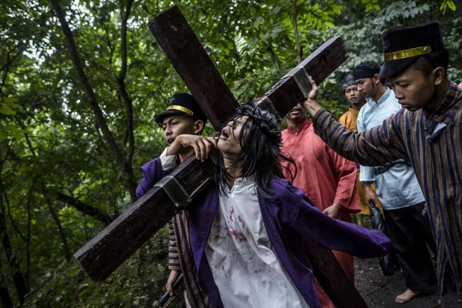 Catholics in Wonogiri, Indonesia, re-enact Christ's crucifixion on April 3.