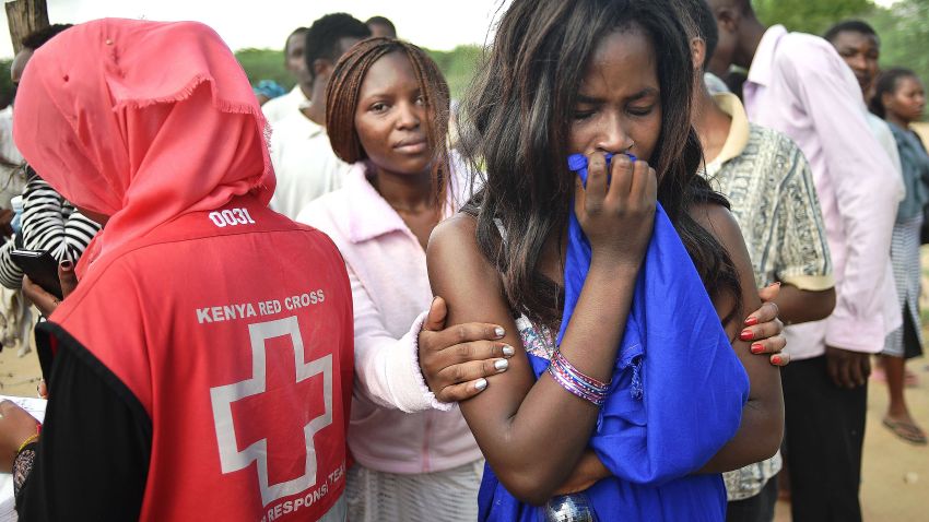Students evacuated from Moi University during a terrorist seige react as they gather together in Garissa on April 3, 2015 before being transported to their home regions.