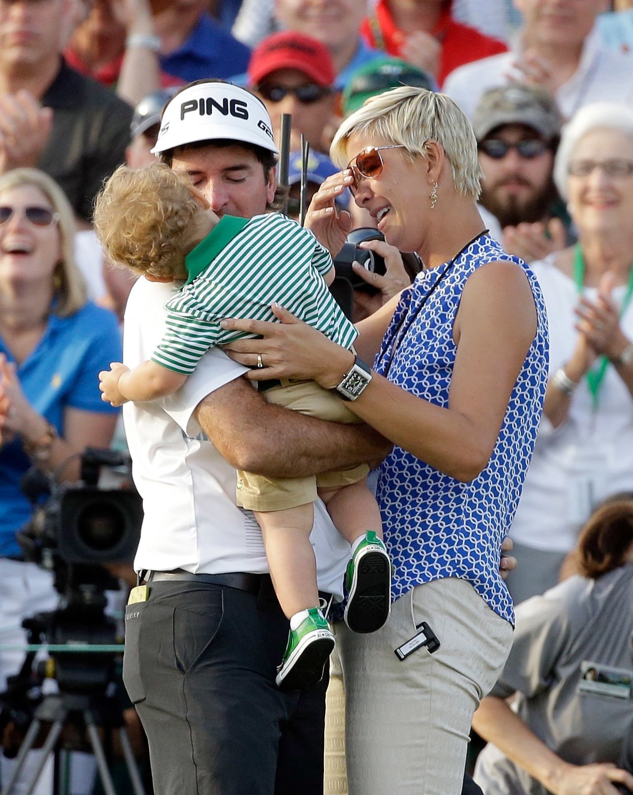 Watson celebrated with wife Angie, who used to be a pro basketball player, and young son Caleb. 