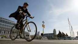 A bicyclist rides his bike down Polk Street on Bike to Work Day May 14, 2009 in San Francisco, California.