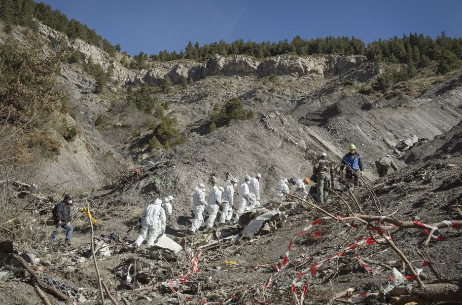 A recovery crew works among debris of Germanwings Flight 9525 at the crash site near Seyne-les-Alpes, France, on Friday, April 3. The crash killed all 150 people aboard and has raised questions about the co-pilot's mental state.