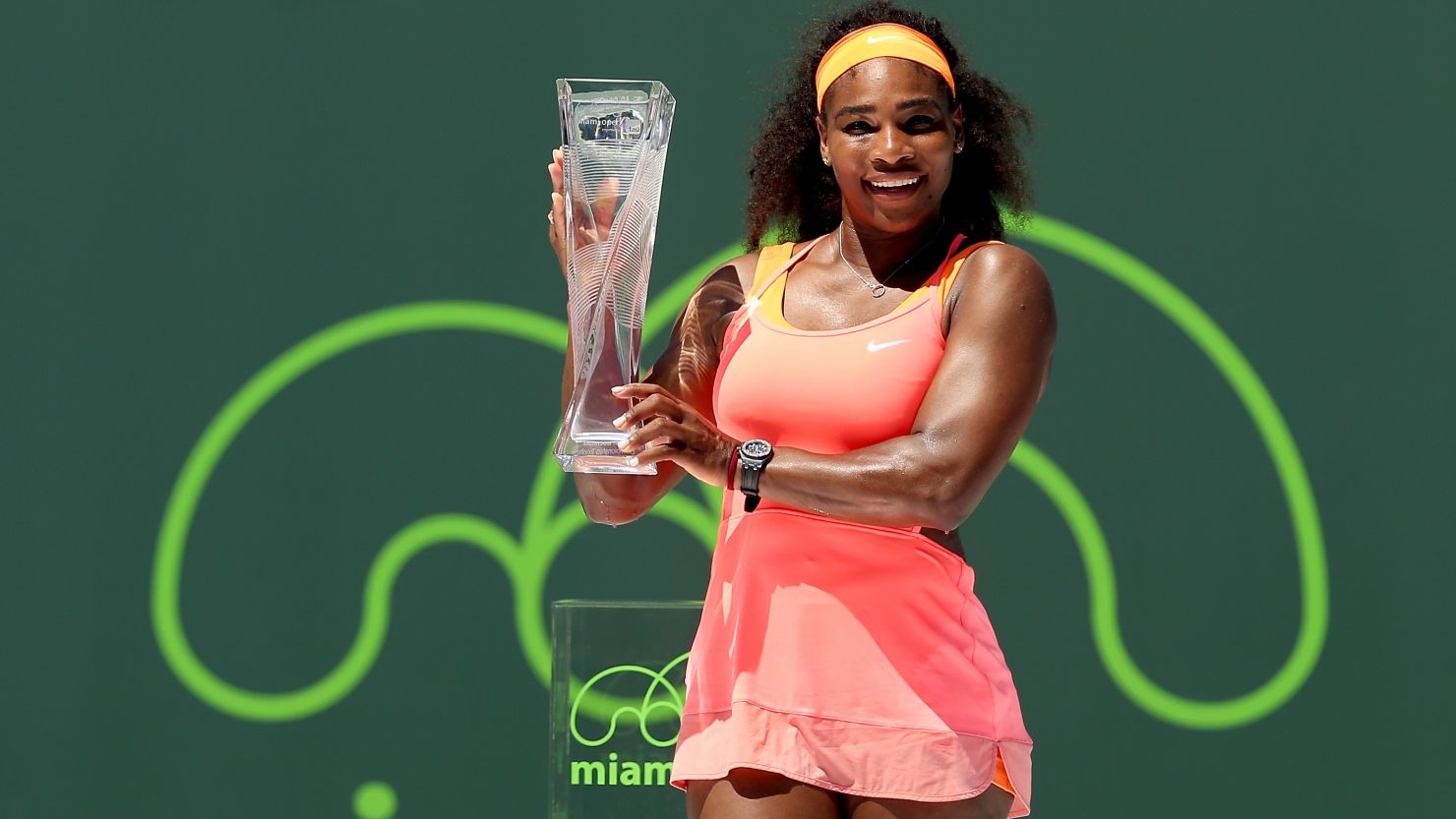 Serena Williams poses after winning the Miami WTA Open.