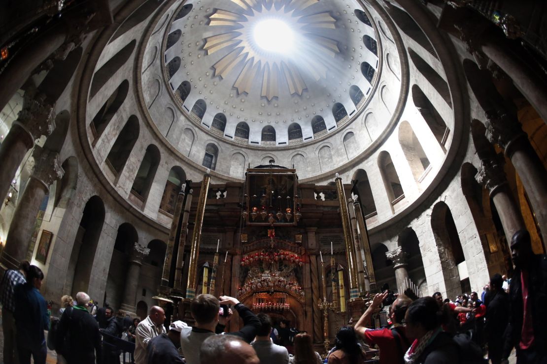 Catholic worshipers visit the Holy Sepuchre Church during the Good Friday ceremony on April 3, 2015 in Jerusalem's Old City.