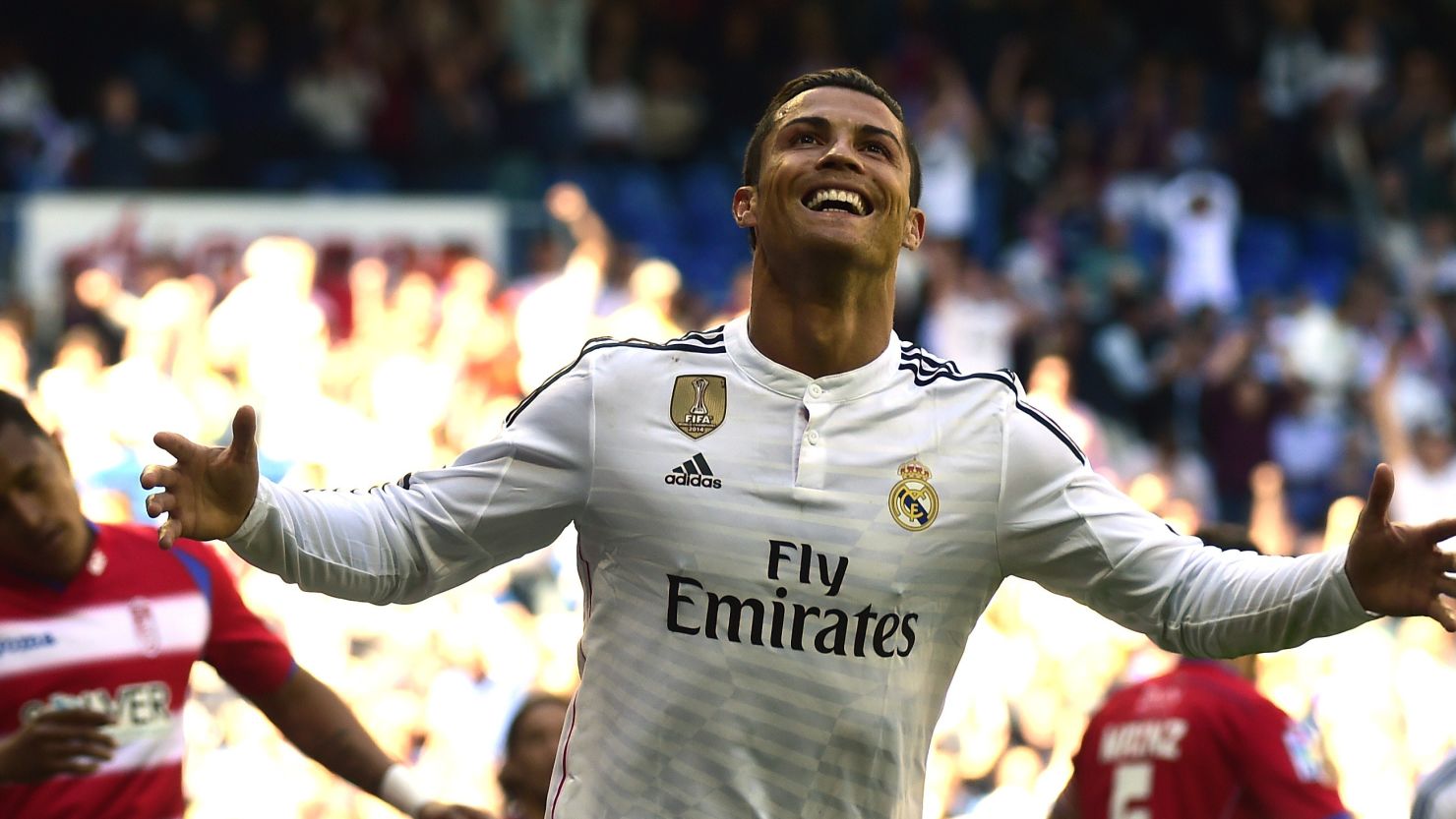 Cristiano Ronaldo celebrates one of his five goals in the 9-1 thrashing of Granada in the Bernabeu.