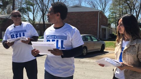 Wesley Bell, center, campaigns near Canfield Drive, where Michael Brown was killed in August.