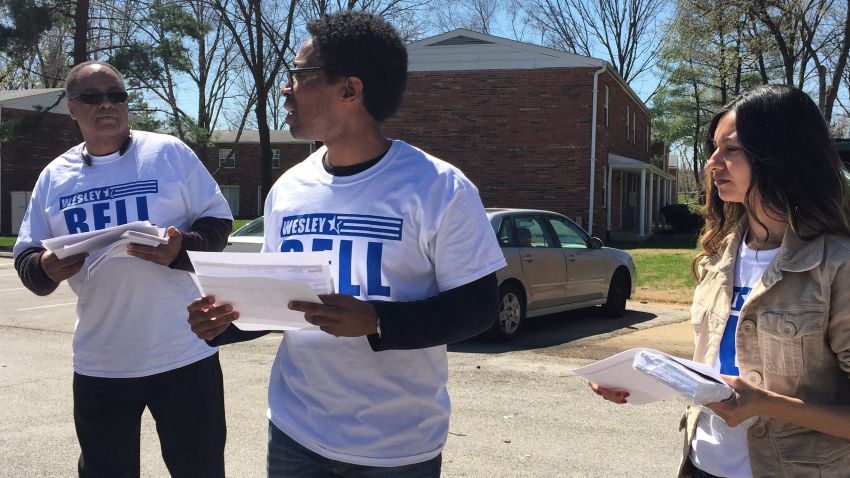 Wesley Bell (middle) campaigns in Ward 3, where Michael Brown was killed.
