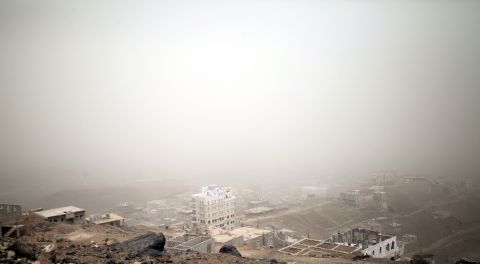 Central Sanaa is covered in dust on Friday, April 3. Airstrikes have turned the bustling capital of Yemen into a ghost town.