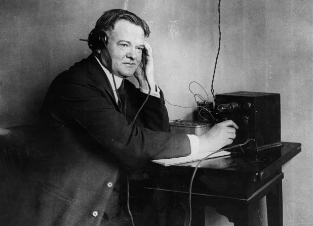 Herbert Hoover listens to a one-valve radio set circa 1928. Hoover's campaign slogan in 1928 was, "A chicken in every pot and a car in every garage."