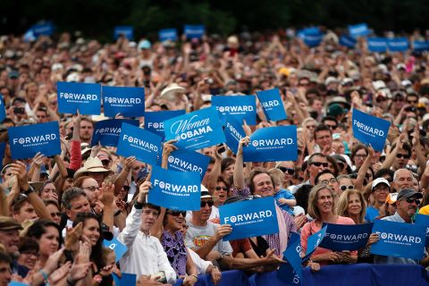 Supporters cheer and wave "Forward" signs as President Barack Obama speaks at a rally on September 2, 2012, in Boulder, Colorado.