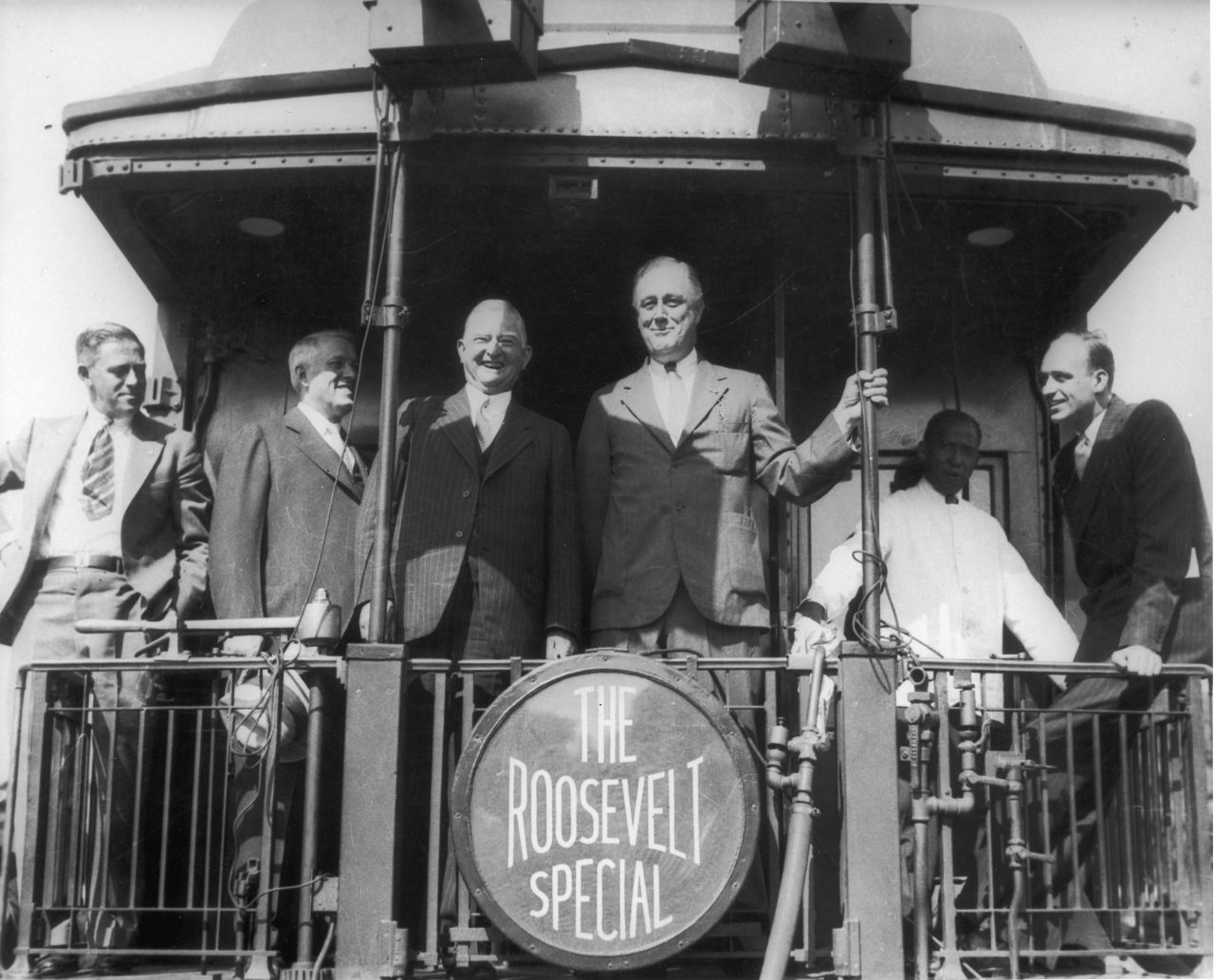 President Franklin D. Roosevelt and his colleagues pose aboard "The Roosevelt Special" campaign train on September 14, 1932. When Roosevelt ran for president eight years later, he used the slogan, "Better a third-termer than a third-rater."