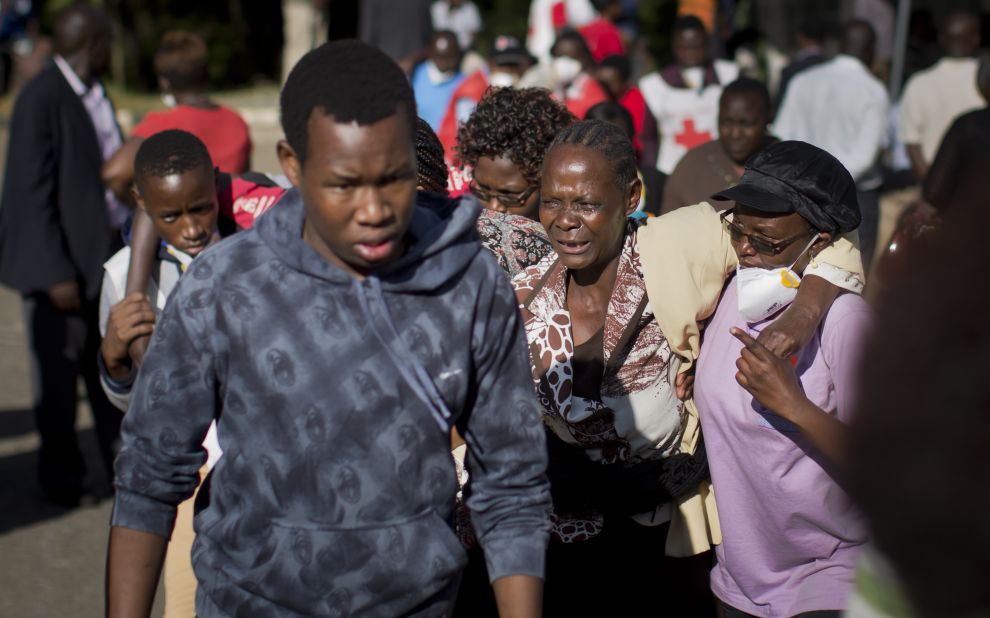 A relative grieves after identifying a body at a funeral home in Nairobi, Kenya, on April 6, 2015. Several days earlier, gunmen stormed Garissa University College in Garissa, Kenya, and killed at least 147 people. The Somalia-based Al-Shabaab militant group claimed responsibility for the assault. 