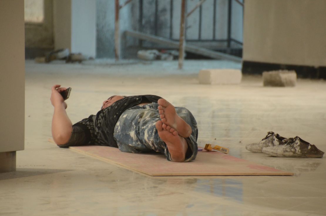 A construction worker takes a break.