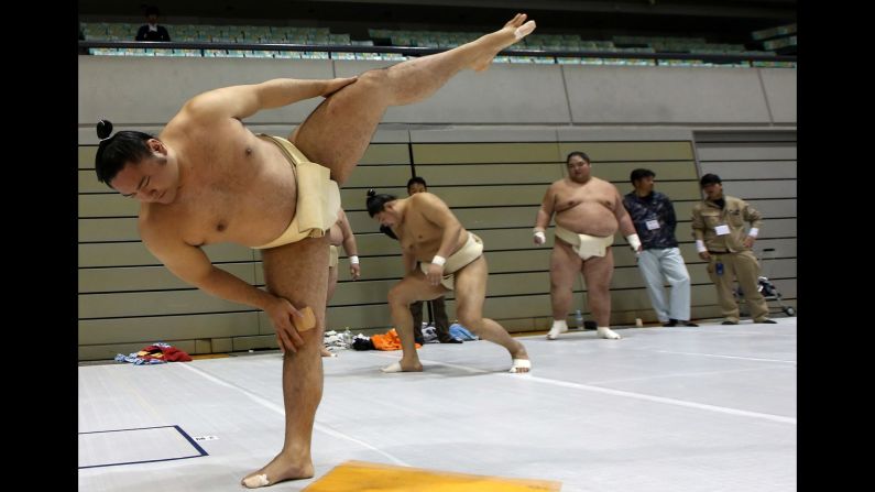 Professional sumo wrestlers train in Himeji, Japan, on Tuesday, March 31.