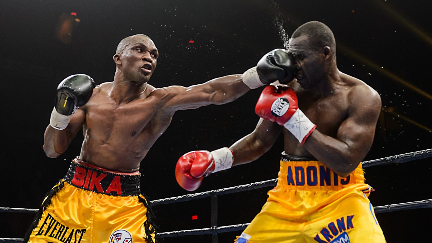 Sakio Bika punches Adonis Stevenson during their light-heavyweight title fight Saturday, April 4, in Quebec City. Stevenson retained his title by unanimous decision.