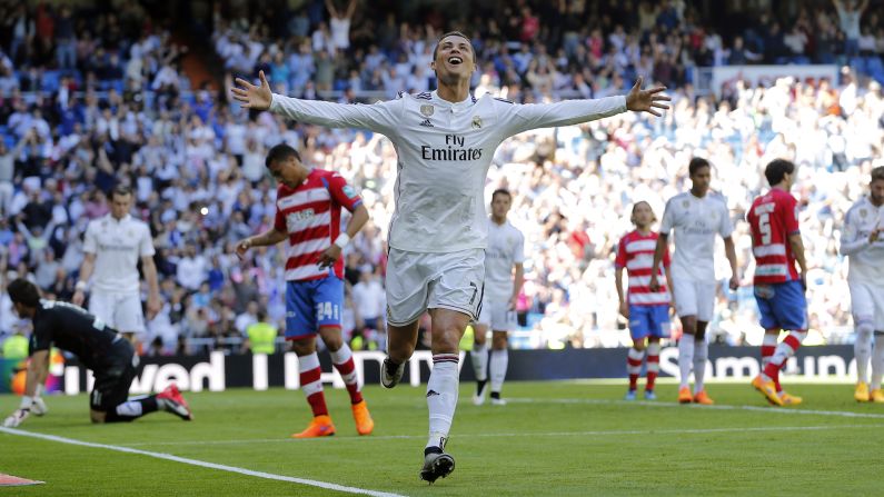 Real Madrid's Cristiano Ronaldo, the reigning World Player of the Year, celebrates after scoring one of his five goals Sunday, April 5, against Granada. Madrid won the home match 9-1.