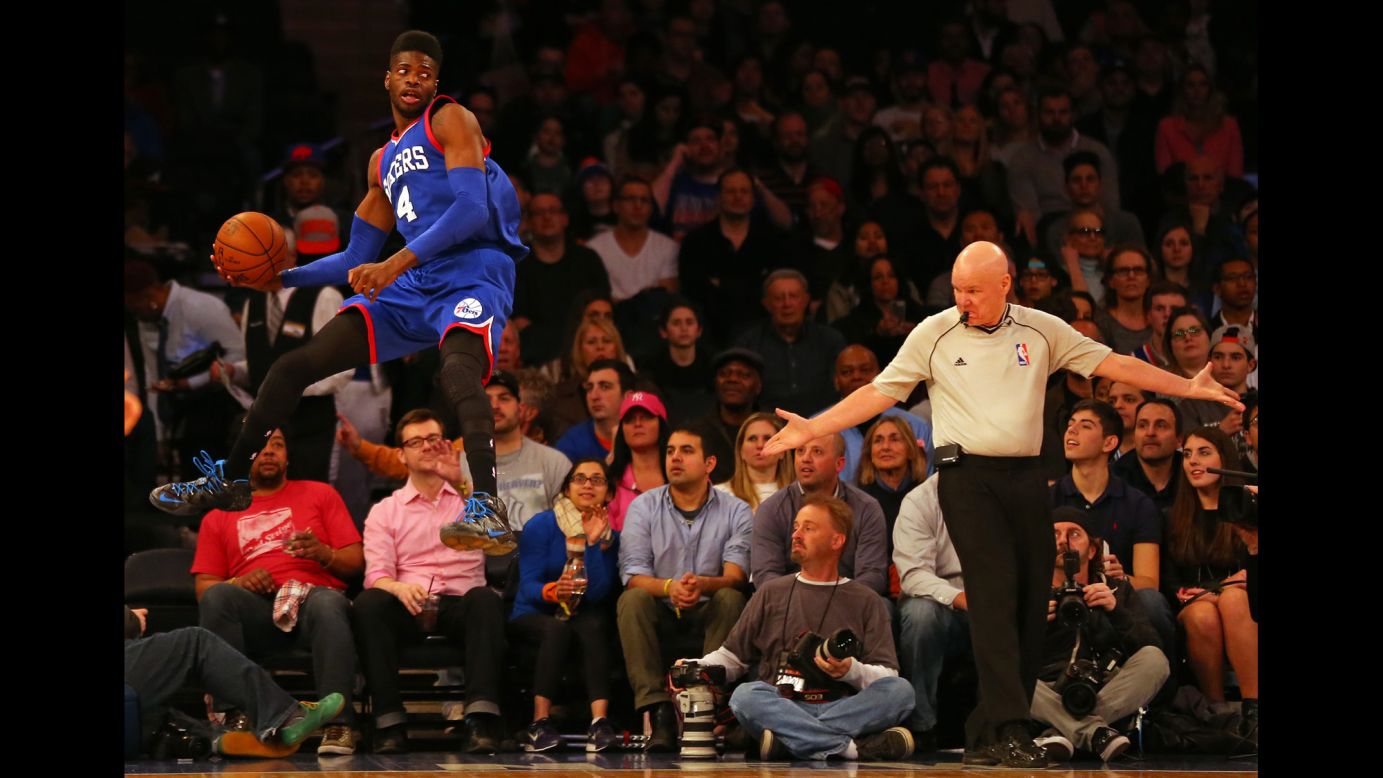 Nerlens Noel, a center for the Philadelphia 76ers, saves the ball from going out of bounds during a game in New York on Sunday, April 5.