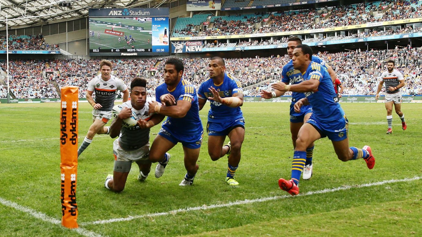 Kevin Naiqama scores a try for the Wests Tigers during their National Rugby League match against the Parramatta Eels on Monday, April 6. The Tigers won 22-6 in Sydney.
