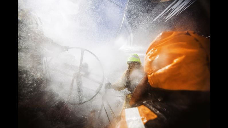 Water sprays on the deck of Team Alvimedica's boat during the Volvo Ocean Race on Wednesday, April 1. The team finished third in the fifth stage of the ocean marathon.
