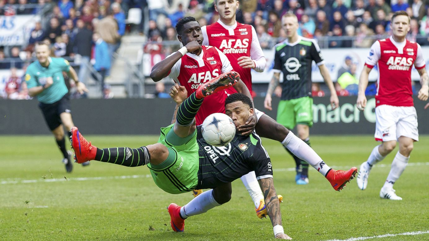 Feyenoord's Colin Kazim-Richards, bottom, is defended by Derrick Luckassen of AZ Alkmaar during an Eredivisie match in Alkmaar, Netherlands, on Sunday, April 5.